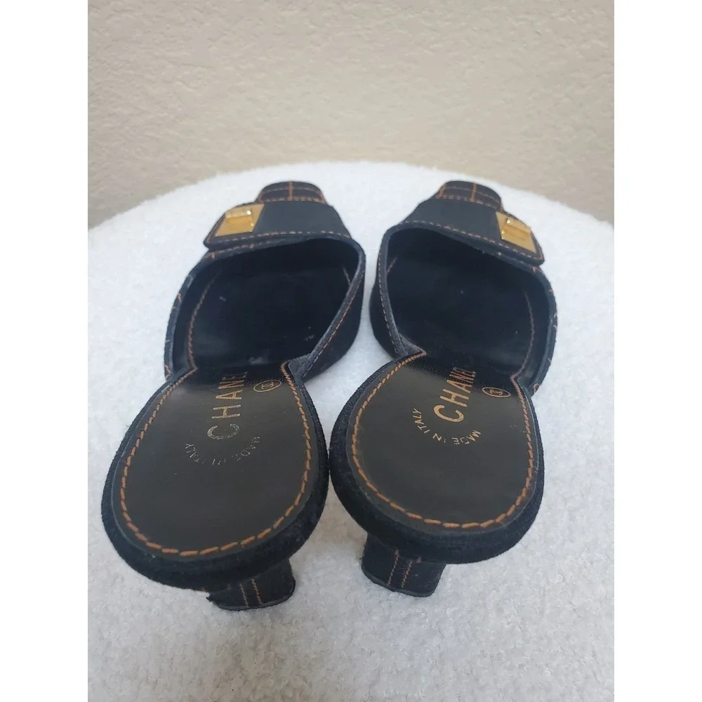 Vintage Y2K Chanel quilted mules, women's size 36.5, with Mademoiselle clasp.